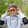 image:imageDUCO Kids Baseball Sunglasses for Boys Girls Age 616 Polarized  UV400 Protection Youth Cycling Goggles for Boys Girls Unbreakable Flexible Frame with Case amp Carry Case08 Blue Frame Revo Orange Lens