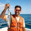 image:imageDUCO Polarized Sports Sunglasses for Men Women UV400 Protection Sun Glasses for Cycling Fishing Running and Driving F101Shine Black Frame Revo Orange Lens